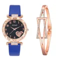 Detailed close-up of blue leather strap watch with rose gold crystal bezel and bracelet - Watch Bracelet / Blue