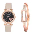 Macro detail of rose gold quartz watch with starry dial and matching open heart bracelet - Watch Bracelet / Off White