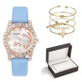 Detail der hellblauen Lederuhr mit Delfin-Zifferblatt und goldenem Armreif-Schmuckset - Himmelblaue Uhr Und Armbänder Mit Geschenkbox