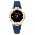 Macro detail of the starry black dial and rose gold rhinestone bezel on leather watch - Watch Only / Blue