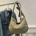 Olive green heart-quilted crossbody bag with a decorative knotted shoulder strap - Green
