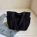 Bolso tote de pana negra de gran capacidad con bolsillos y diseño minimalista - Negro