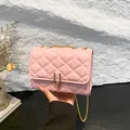 Pink quilted chain crossbody bag with elegant gold lock and diamond stitching - Pink