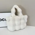 Chic white plush tote bag with wavy faux fur texture and matching soft handles - White