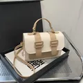 Elegante borsa a tracolla bicolore panna e kaki con fibbie dorate e manico - Cachi