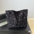 Black corduroy tote bag with pink strawberry prints and large capacity shoulder straps - Black