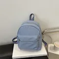 Mini lichtblauwe waterdichte rugzak met meerdere zakken en nylon textuur - Blauw