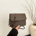 Brown minimalist square shoulder bag with matte finish and resin chain detail - Coffee
