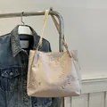 Pink floral tote bag with delicate rose embroidery and long elegant shoulder straps - Pink