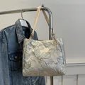 Large capacity tote bag in light blue floral jacquard with butterfly print - Blue