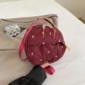 Chic quilted burgundy round crossbody bag with delicate bow embroidery and top handle - Burgundy
