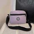 Light purple oxford fabric crossbody bag with sport logo and adjustable wide strap - Purple