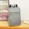 Versatile grey business laptop backpack with textured fabric and large capacity - Gray