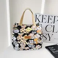 Cartoon cat print canvas tote bag with black background and brown leather patch - Black