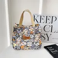 Canvas tote bag with cute cartoon cat pattern and front pocket in grey and orange - Gray