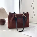Brown corduroy tote bag with chain strap and fashion label in a retro casual style - Coffee