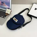 Dark blue nylon crossbody bag in a creative baseball cap shape with adjustable strap - Blue