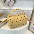 Floral yellow corduroy pouch with heart patterns on white stand for storage - Floral Yellow Style