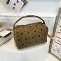 Olive green corduroy makeup bag with black floral pattern and handle closure - Floral Brown