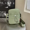 Petit sac bandoulière vert pois en nylon avec sangle réglable et cordon décoratif - Vert