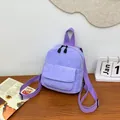 Mini lavender corduroy backpack with adjustable straps and front pocket for daily use - Purple