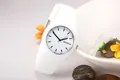 Close-up of Geneva white silicone quartz watch dial with black index markers - White