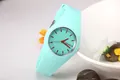 Close-up of Geneva silicone watch in mint green with red hands on a creative background - Mint Green