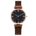 Detail of starry dial quartz watch with roman numerals and magnetic mesh band - Coffee