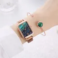 Detail of rose gold rectangular watch with emerald gradient dial and matching bracelet - Green Watch Bracelet Set