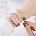 Detail of rose gold rectangular watch with pink dial and matching malachite cuff bracelet - Pink Watch Bracelet Set