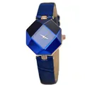 Women's quartz watch with blue faceted glass dial and rose gold case on white background - Blue