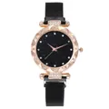 Detailed macro of starry sky dial with rhinestones and rose gold scalloped bezel - Black