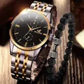 Mens business watch and dumbbell bead bracelet set with two-tone steel strap on wood surface - Gold Silver Black Watch And Bracelet