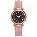 Détail d'une montre femme ciel étoilé avec verre facetté et boîtier en or rose - Montre / Rose