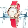 Detail of rose gold watch bezel with rhinestones and red leather texture strap with water splash - Rose Red