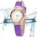 Women's quartz watch with purple leather strap and rhinestone bezel on splash background - Purple
