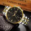 Close-up of luxury two-tone stainless steel watch with black dial and gold indices - Two-tone Black Dial