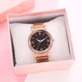Macro shot of rose gold mesh watch with starry black dial in pink marble gift box - Rose Gold Watch With Case
