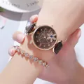 Close-up of rose gold watch and sparkling heart bracelet set on a female wrist - Watch And Bracelet / Brown