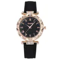 Primo piano della cassa dell'orologio in oro rosa con cristalli e quadrante stellato - Orologio Singolo / Nero