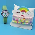 Detail of light green kids watch with floral dial and matching rainbow beaded bracelet set - Green Flower