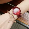 Detail of burgundy starry watch face and matching rose gold star bracelet set - Watch & Bracelet Set / Red