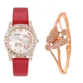 Detailed view of women's gold rhinestone watch with red leather strap and butterfly bangle - Red Watch + Butterfly Bracelet