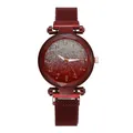Detail of burgundy gradient dial with glitter effect and multifaceted glass on mesh watch - Watch Only Style / Red