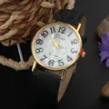 Geneva quartz watch with golden case, marble effect dial and black leather strap - Black
