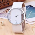 Detail of minimalist quartz watch with white leather strap and hollow rectangular dial - White