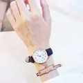 Set elegante con orologio al quarzo stella oro rosa, cinturino blu e bracciale coordinato - Set Orologio e Bracciale / Nero