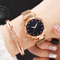 Dettaglio dell'orologio da donna in oro rosa con quadrante stellato e bracciale con stella - Orologio Rosa Oro Bracciale