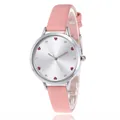 Detail view of pink leather watch with heart-shaped indices and sparkling rhinestones - Pink
