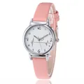 Macro detail of quartz watch dial with heartbeat pattern and artistic digits - Pink